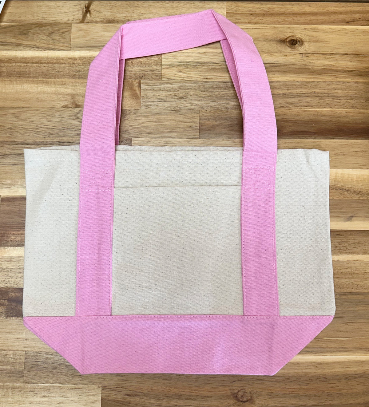 Bulk promotional canvas tote bags stacked and ready to ship from California
