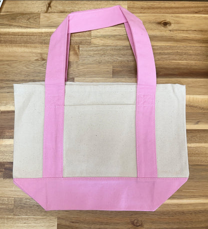 Bulk promotional canvas tote bags stacked and ready to ship from California
