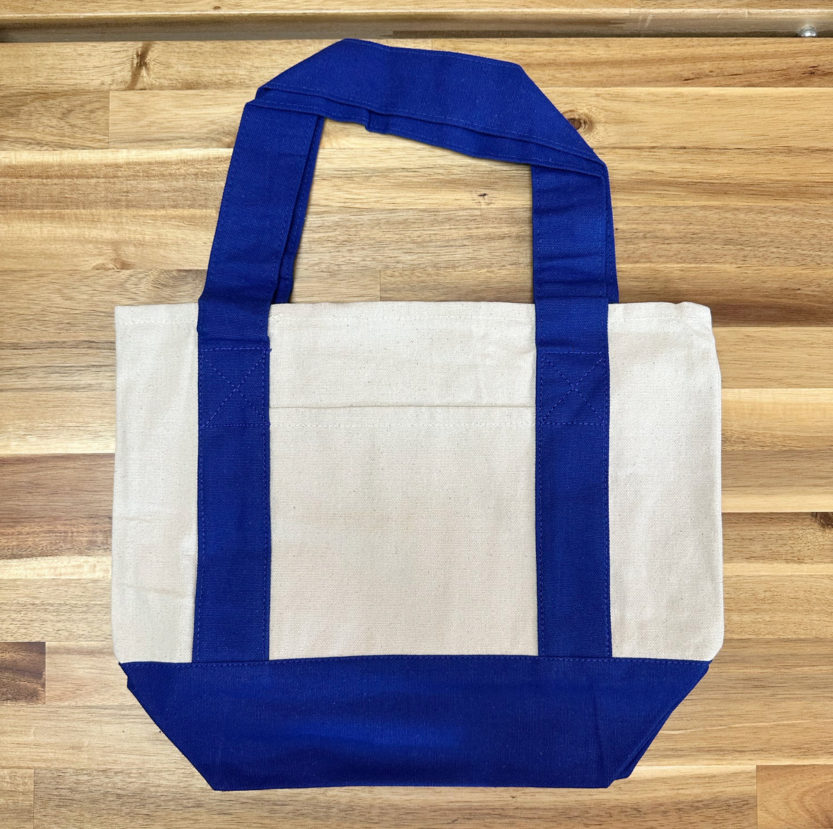 Mini canvas gift bag tote filled with party favors, wedding gifts and holiday presents
